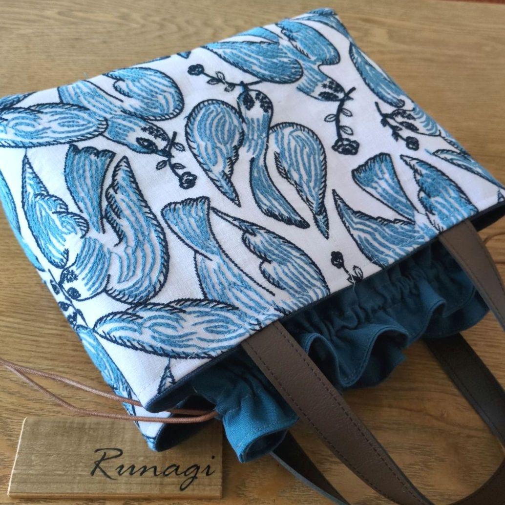 【1565】あおりポケットの巾着バッグ＊ミナペルホネン