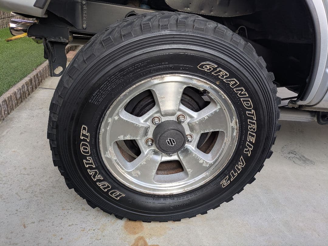 ジムニーJA22純正ホイール・ダンロップ　グラントレックMT2です。