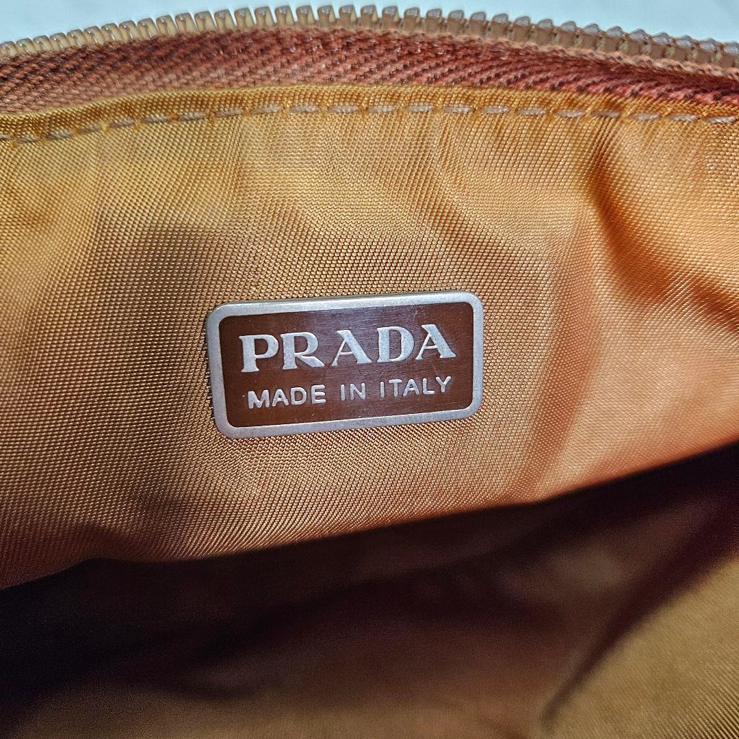 PRADA アクセサリーポーチ 三角ロゴ ナイロン オレンジ