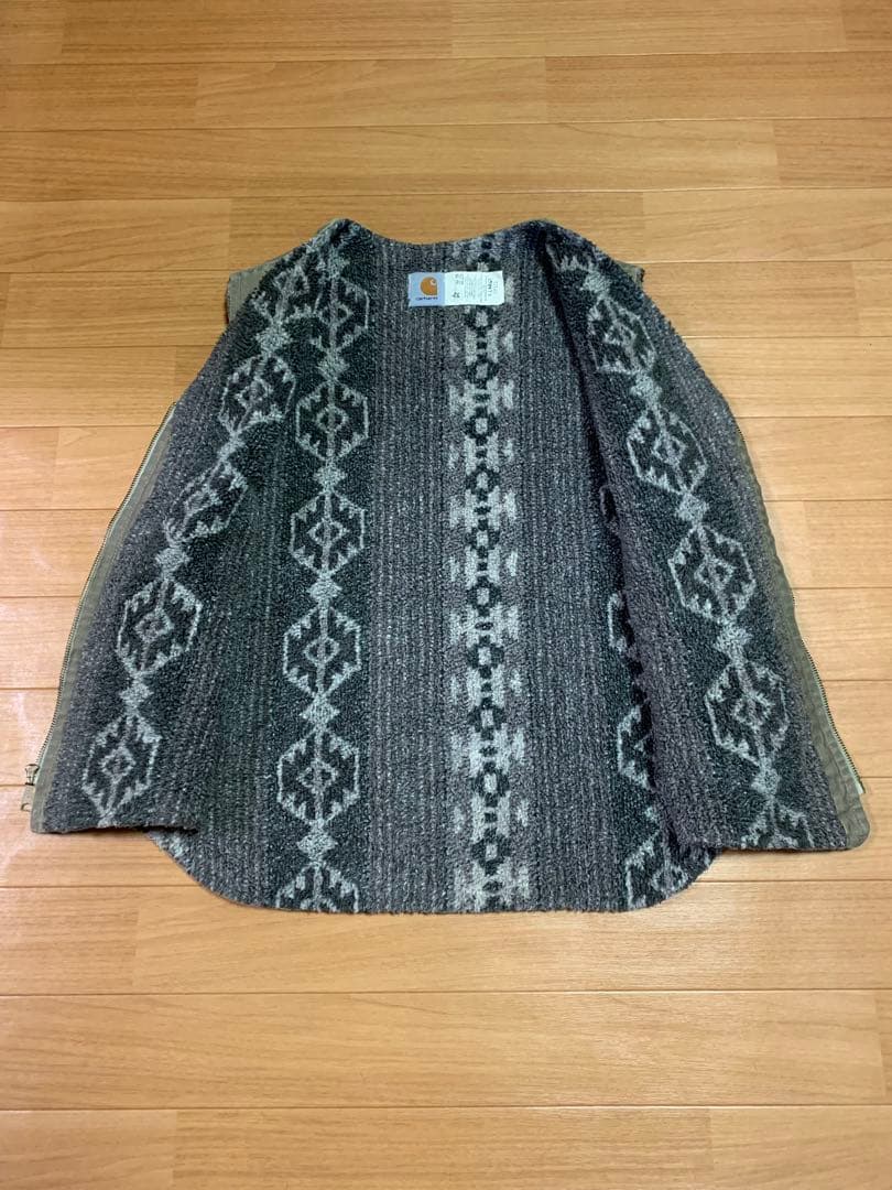 USA Carharttダック地ベスト 裏地ネイティブ柄 ボア ライナーXL