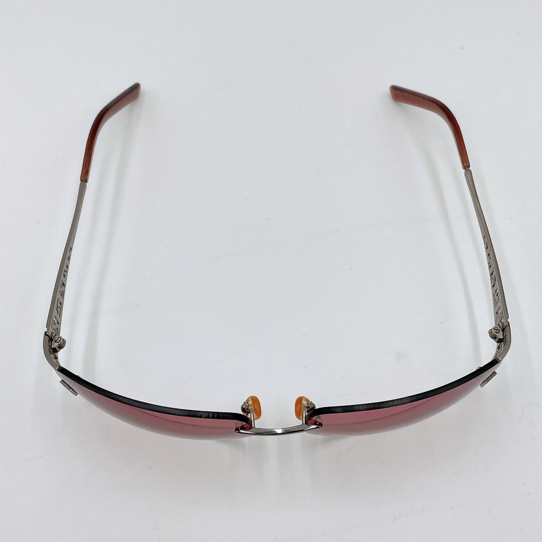 良品 FENDI フェンディ ズッカ柄 リムレス FFロゴ サングラスm524