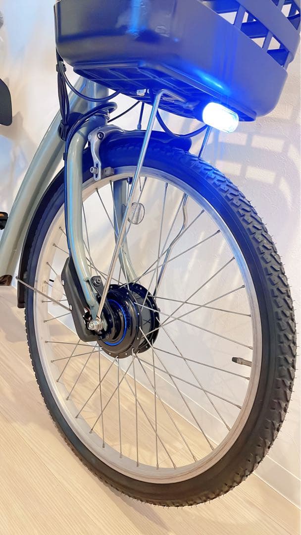 ブリヂストンの電動アシスト自転車、26インチ、ターコイズ。