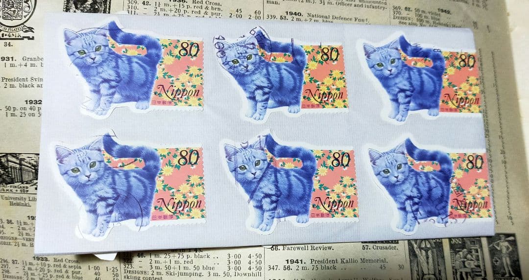 確認用！1999年グリーティング切手猫使用済28枚台紙張畳んで郵送