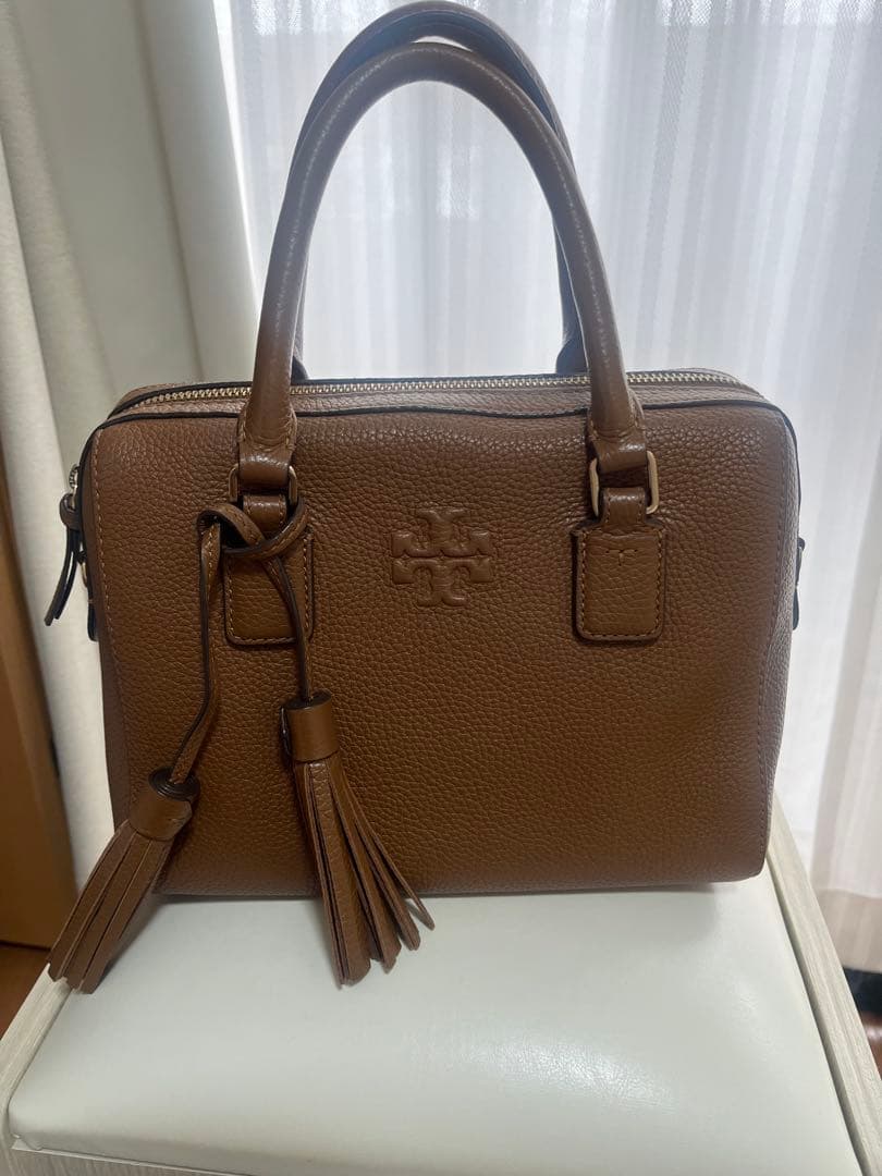 な*ぺ様 ブラウンレザー ハンドバッグ タッセル付き