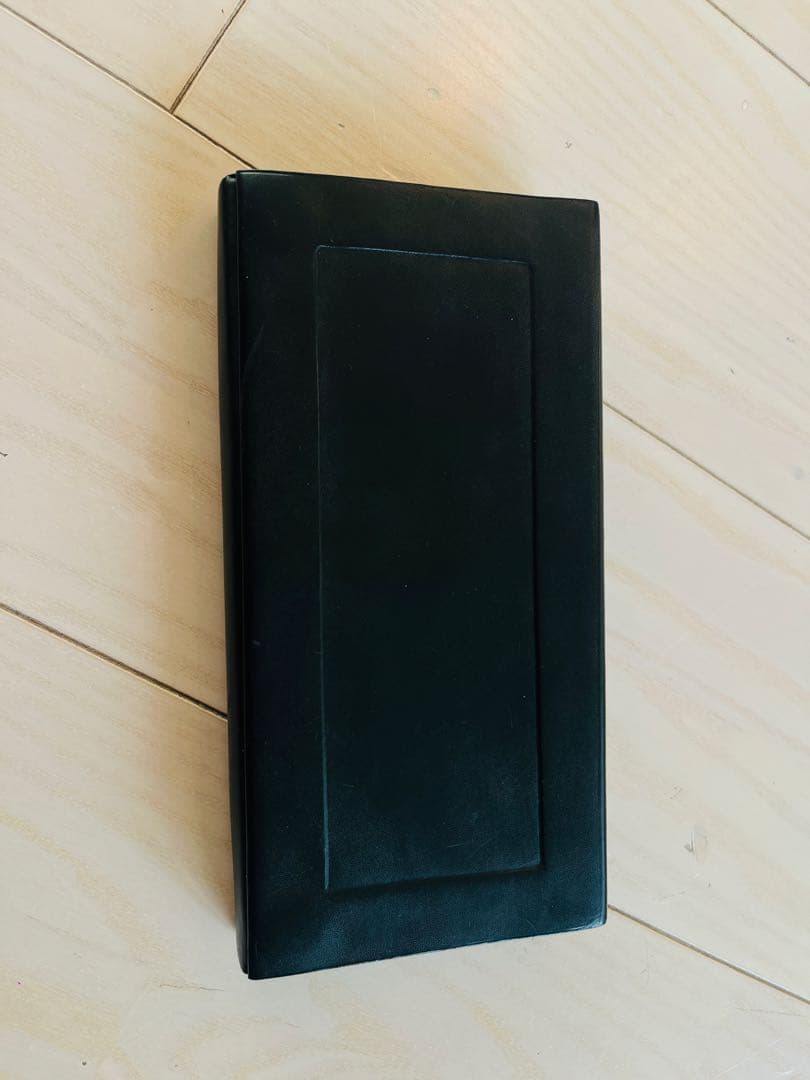 ISAAC REINA クラッチバッグ