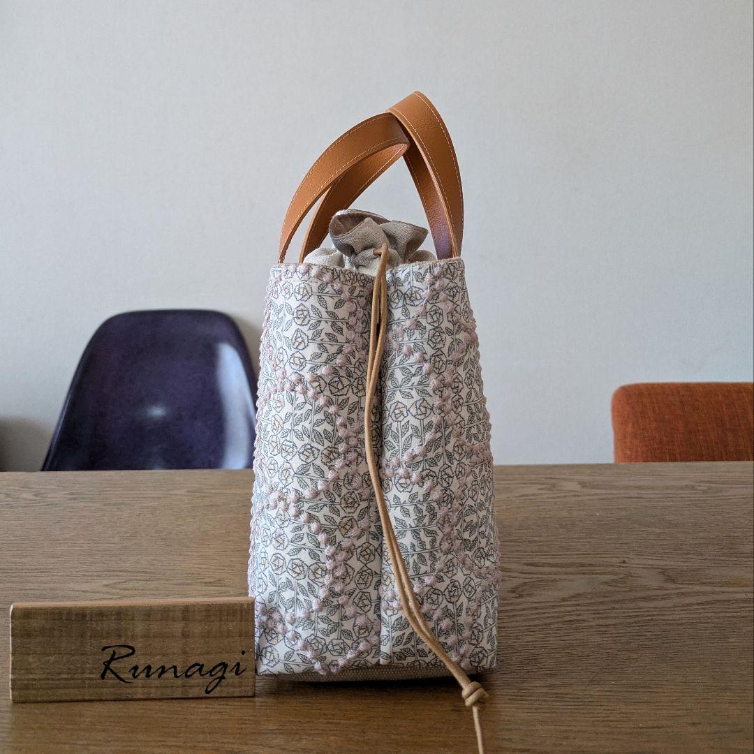 【1548】あおりポケットの巾着バッグ＊ミナペルホネン